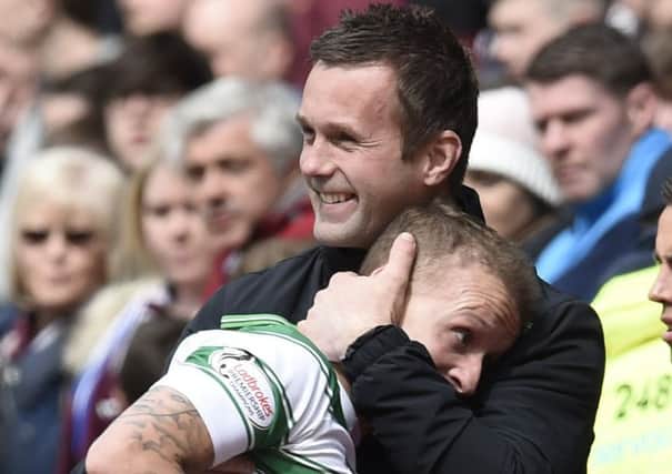 Celtic manager Ronny Deila hugs Leigh Griffiths. 

Picture Ian Rutherford