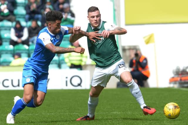 QOTS's Callum Tapping (left) battles against Anthony Stokes. Picture: SNS
