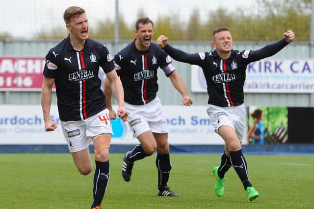 Paul Watson celebrates having put Falkirk ahead. Picture: SNS