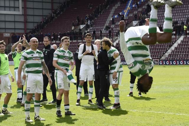 Efe Ambrose performs a backflip as Celtic get into party mode.
Picture: Ian Rutherford