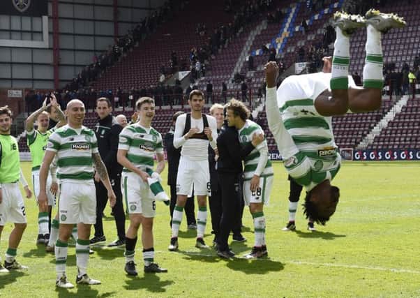 Efe Ambrose performs  a backflip as Celtic get into party mode.

Picture: Ian Rutherford
