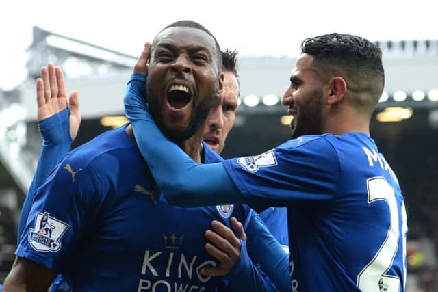 Wes Morgan (L) celebrates scoring the equalising goal. Picture: AFP/Getty