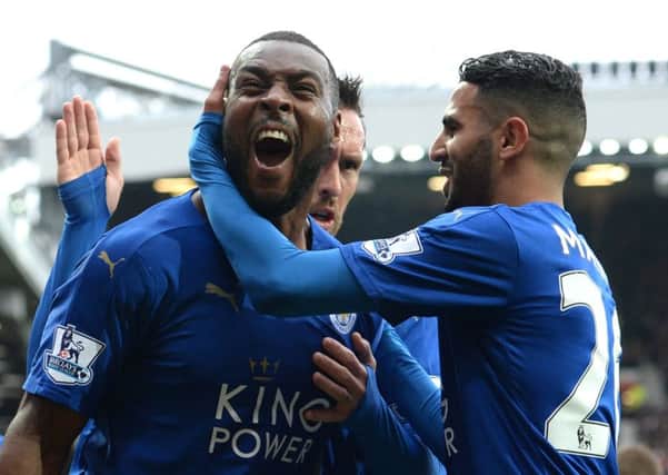 Wes Morgan (L) celebrates scoring the equalising goal. Picture: AFP/Getty