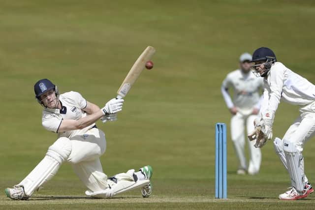 Pete Ross sweeps during the Heriots innings but it was Carlton who claimed the opening-day win. Picture: Neil Hanna