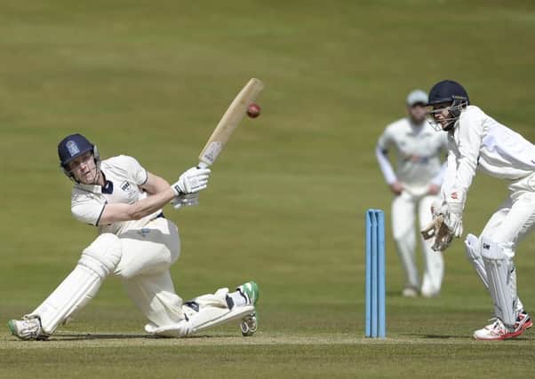 Pete Ross sweeps during the Heriots innings but it was Carlton who claimed the opening-day win. Picture: Neil Hanna