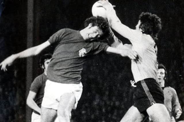 Hamish McAlpine grabs the ball in Uniteds crucial 0-0 draw at Ibrox that saved them from the drop. Picture: Daily Record