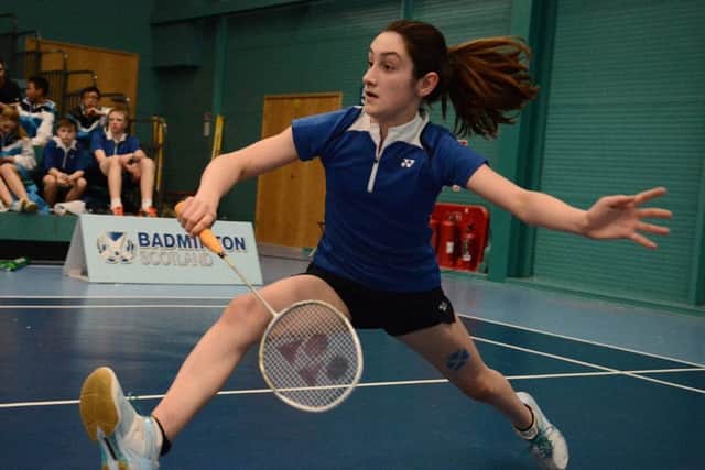 Rachel Sugden on her way to winning the girls singles final.