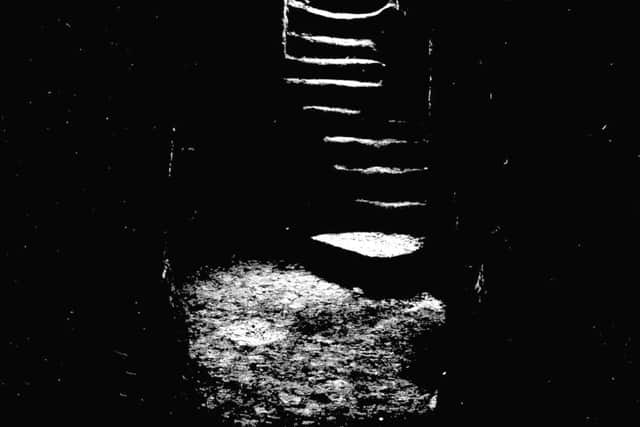 Gilmerton Cove - Underground house cave - The entrance to the cave showing the well worn steps.