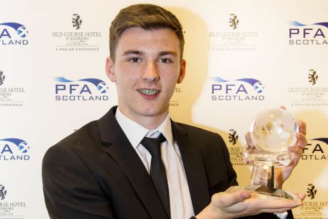 Celtic's Kieran Tierney with his Young Player of the Year trophy. Picture: Craig Foy/SNS