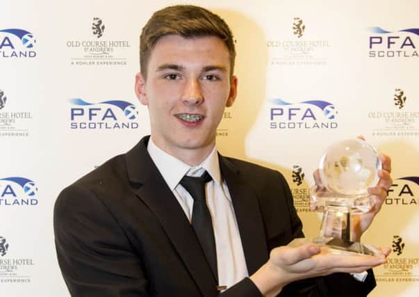 Celtic's Kieran Tierney with his Young Player of the Year trophy. Picture: Craig Foy/SNS