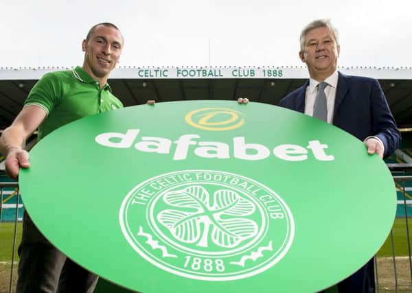 Celtic Chief Executive Peter Lawwell, right, and captain Scott Brown announce the biggest ever shirt sponsorship deal in Scottish football history as Dafabet are named as a newm main club sponsor. Picture: Craig Foy/SNS