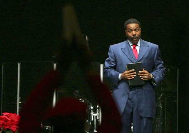 US televangelist Creflo Dollar on stage. Picture: Ting-Li Wang/The New York Times
