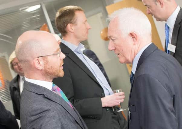 MP Martin Docherty-Hughes, left, talks to CircoSense managing director Gerry Kennedy at the launch event. Picture: Contributed