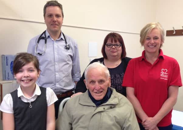 Lana with her granddad Peter Whyte, pictured with Dr Jonathan Watt, consultant cardiologist, Mandi Smith, lead heart failure nurse, and Niki Russell, BHF familial hypercholesterolaemia specialist nurse
