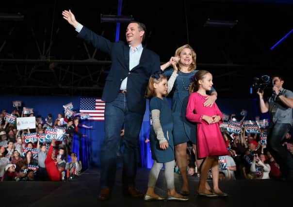 Republican presidential candidate Sen. Ted Cruz, his wife Heidi Cruz and their children stand together during a campaign rally at the Indiana State Fairgrounds. Picture: Getty Images