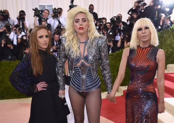 Allegra Versace Beck, Lady Gaga, and Donatella Versace. Picture: Getty Images