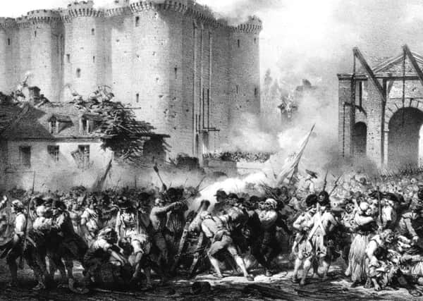Crowds storm the hated Bastille prison fortress on 14 July, 1789, in what is seen as the curtain-raiser of the revolutionary period. Image: Hulton Archive/Getty