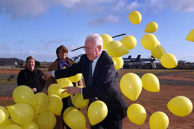 Scottish Liberal Democrat leader and Deputy First Minister Jim Wallace kicks-off his party's Holyrood campaign in April 2003 with a balloon release. Picture: Jon Savage/TSPL