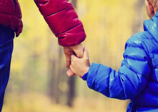 Families should be trusted to ensure that their children and young people grow up feeling happy and secure. Picture: Contributed
