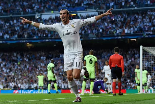 Gareth Bale celebrates after his shot was diverted into the Manchester City net in the Champions League semi-final, second leg at the Santiago Bernabeu. Picture David Ramos/Getty Images