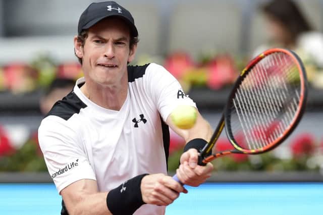 Andy Murray plays a returns to Gilles Simon during his last-16 win in Madrid. Picture: Javier Soriano/AFP/Getty Images