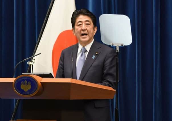 Shinzo Abe expressed 'profound grief' for the war. Picture: AFP/Getty