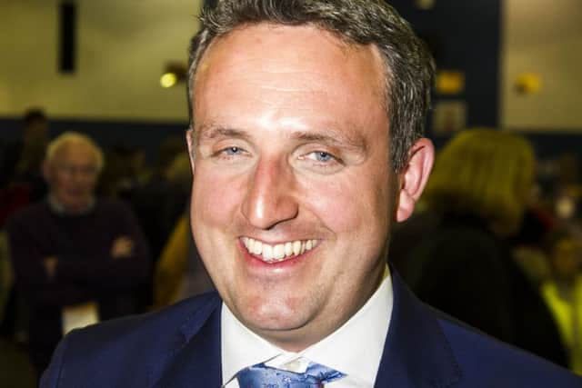 Lib Dem Alex Cole-Hamilton in celebratory mood after winning Edinburgh Western.