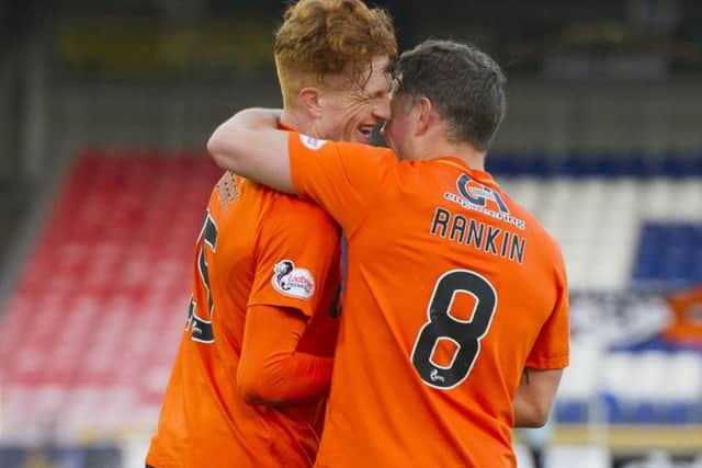 Dundee United goal hero Simon Murray, left, celebrates with John Rankin. Picture: Ross Parker/SNS