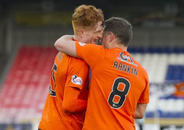 Dundee United goal hero Simon Murray, left, celebrates with John Rankin. Picture: Ross Parker/SNS