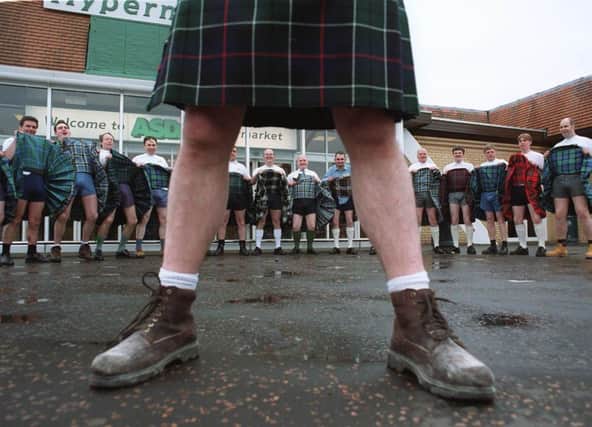 Barmen at an Inverness pub who wore kilts to work have been forced to switch to wearing trousers after female revellers harassed them. Picture: PA
