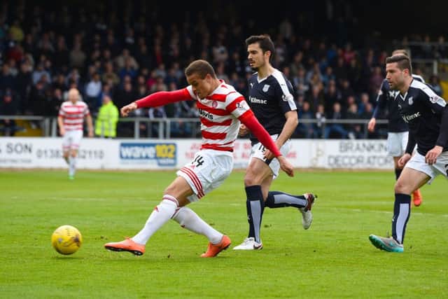 Hamilton's Carlton Morris scores the goal that ensures Accies will be in the top flight next season. Picture: Craig Williamson/SNS