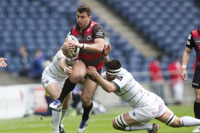Edinburgh's Damien Hoyland gets away from Cardiff's Tom James and Ellis Jenkins. Picture: Graham Stuart/SNS