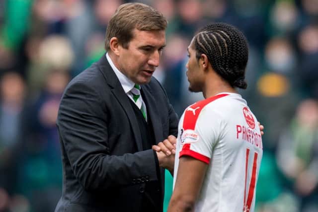 Hibs manager Alan Stubbs commiserates with Raiths Harry Panayiotou. Picture: SNS
