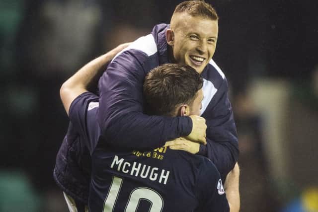 Bob McHugh and John Baird embrace at the full-time whistle. Picture: SNS