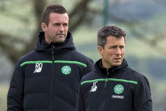 Collins, right, says he'll follow Ronny Deila out of Celtic Park. Picture: SNS