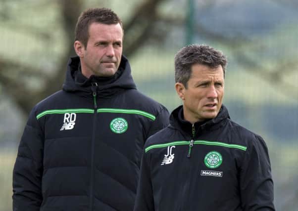 Collins, right, says he'll follow Ronny Deila out of Celtic Park. Picture: SNS