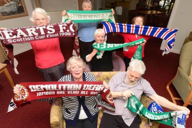 Residents Helen Renton, Isabella Crawford, Doreen Allen, Muriel Poingdestre and John Young are among those benefiting from the football memories scheme. Picture: contributed