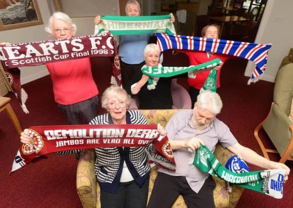 Residents Helen Renton, Isabella Crawford, Doreen Allen,  Muriel Poingdestre and John Young are among those benefiting from the football memories scheme. Picture: contributed