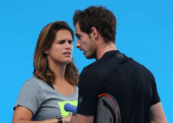 Andy Murray and Amelie Mauresmo during a practice session ahead of the Australian Open final. Picture: Getty