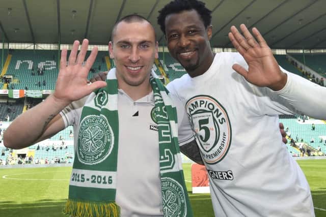 Efe Ambrose celebrates with Scott Brown at full-time. Picture: SNS