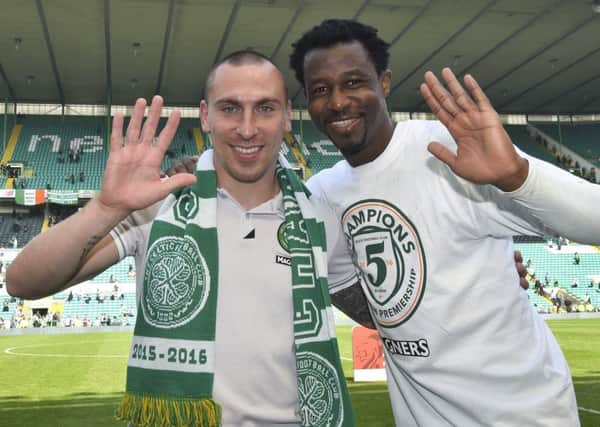 Efe Ambrose celebrates with Scott Brown at full-time. Picture: SNS