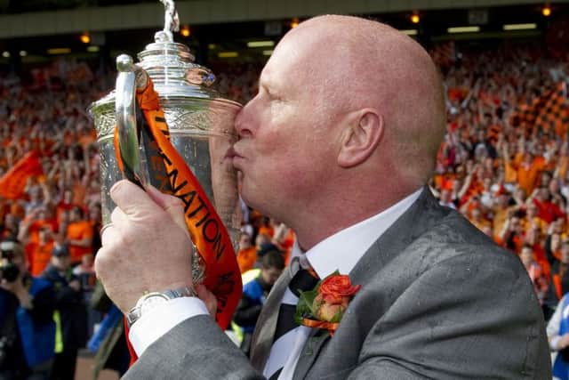 Houston with the Scottish Cup after Dundee Uniteds 3-0 final  victory over Ross County in 2010. Picture: SNS
