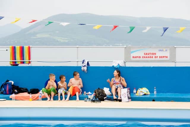 Sunbathers and swimmers enjoy the outdoor pool at Gourock. Picture: John Devlin