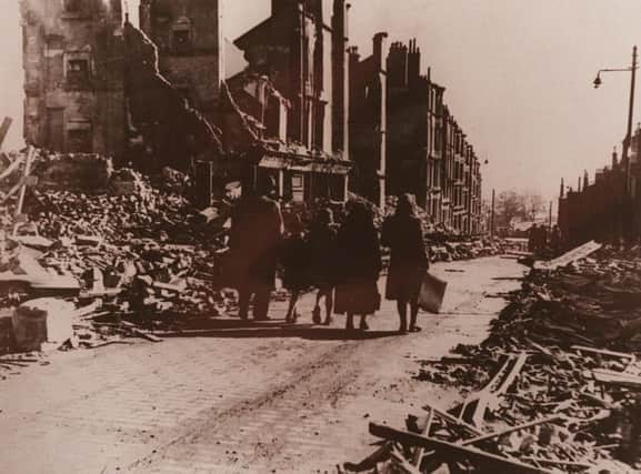 Residents evacuate Radnor Street in Clydebank after the bombing raids in March 1941. Picture: Contributed