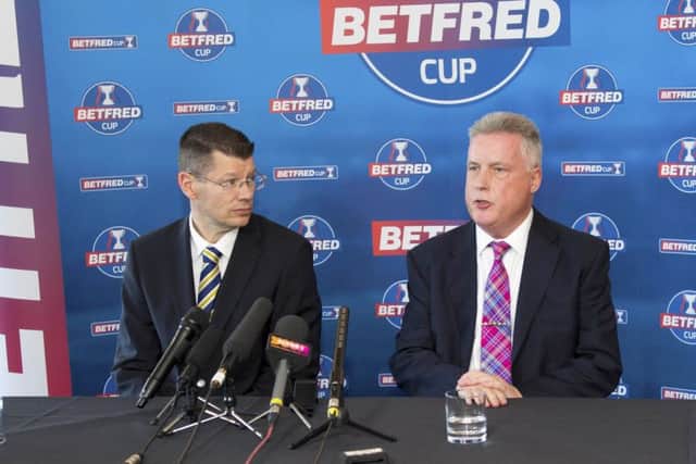 SPFL chief Neil Doncaster, left, with Betfreds John Haddock. All three major club competitions are now sponsored by bookmakers. Picture: SNS