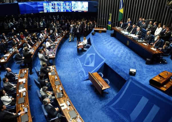 The Senate votes overwhelming 55-22 to suspend Brasilian President Dilma Rousseff and launch an impeachment trial. Picture: AFP/Getty Images