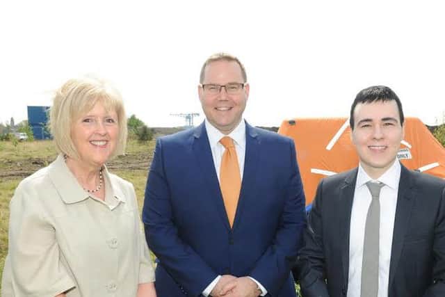 Clyde Group's Joyce Downie and Colin McMurray with Councillor Patrick McGlinchey, right. Picture: Contributed