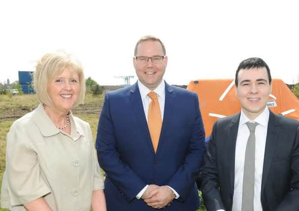 Clyde Group's Joyce Downie and Colin McMurray with Councillor Patrick McGlinchey, right. Picture: Contributed