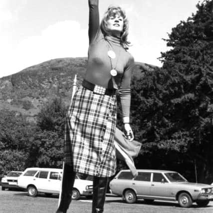 Sya Laidlay practices for the world's first haggis hurling competition at Prestonfield House Hotel, part of the Gathering of the Clans in Edinburgh,  April 1977.
