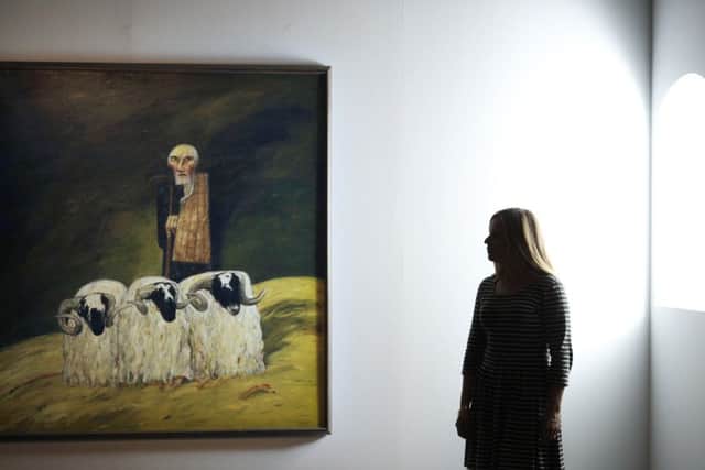Lizzie Cowan of Dovecot Galleries beside The Ettrick Farmer by John Bellany. Picture: Neil Hanna